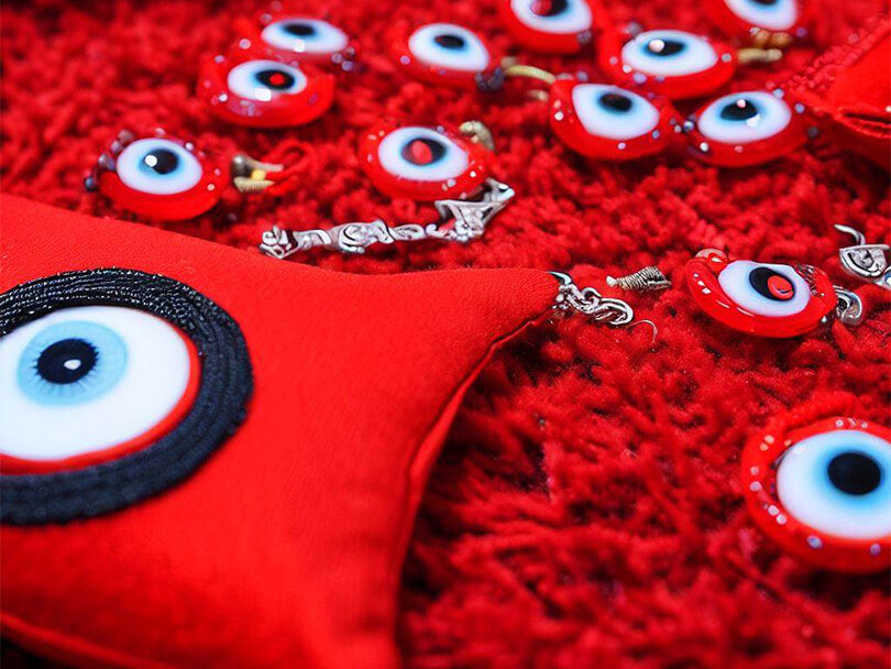 A Range Of Red Evil Eye Products