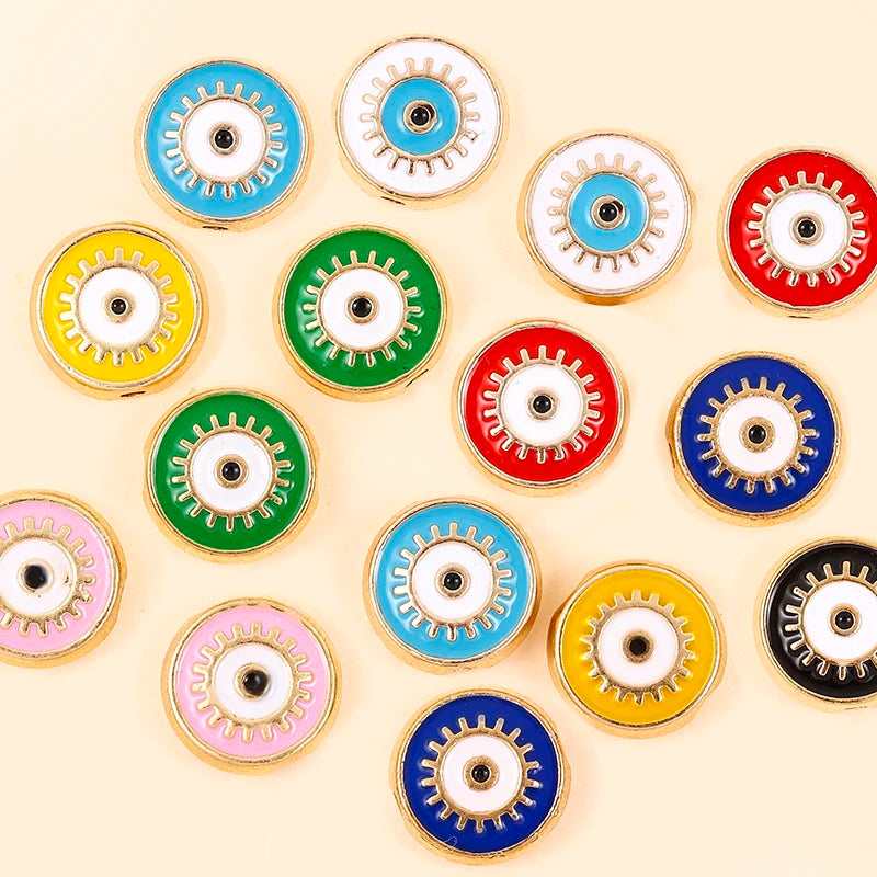 Nine round evil eye charm bead color designs arranged in rows