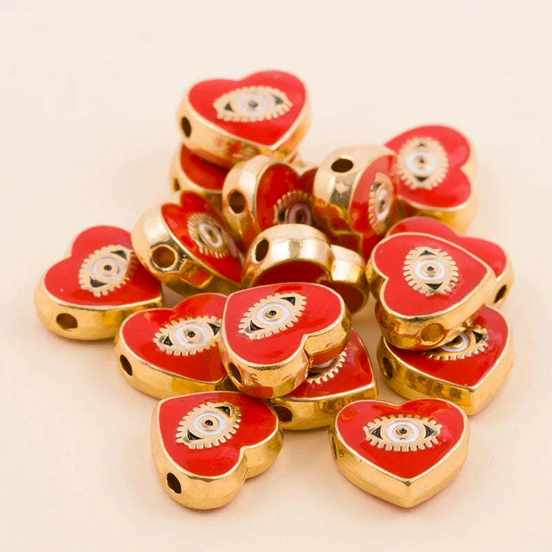 Red teardrop-shaped evil eye charm beads