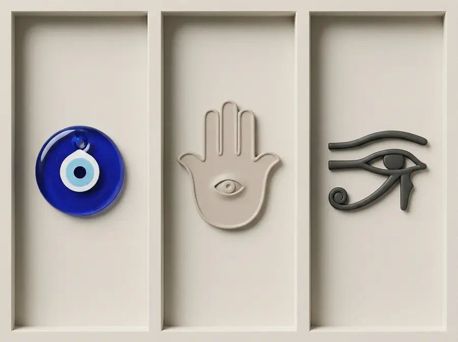 Round glass bead, open hand form, and wedjat profile occupy three equal, isolated study fields