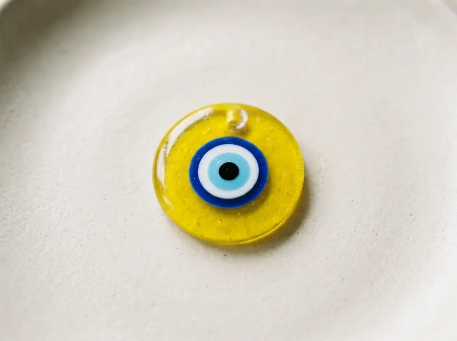 Yellow Evil Eye Meaning: Optimism, Focus, and How to Choose - disambiguation eye shape carries older cultural