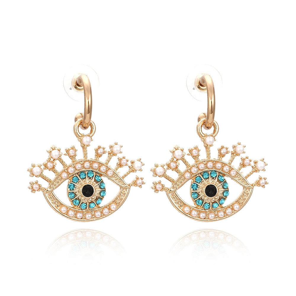 rhinestone evil eye tassel earrings