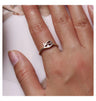 Close-up of a hand wearing a 925 sterling silver adjustable evil eye ring