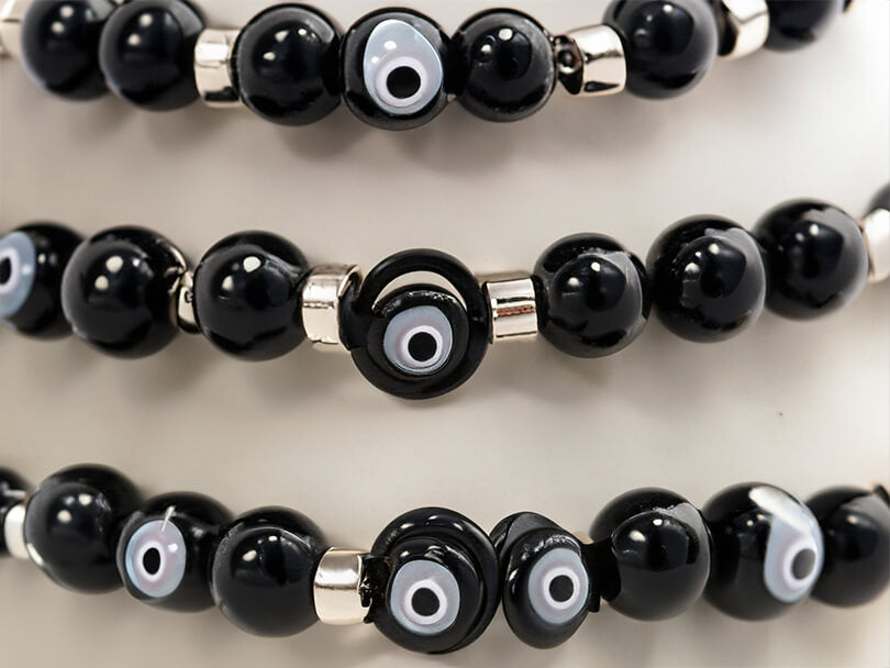 A Variety Of Black Evil Eye Jewelry