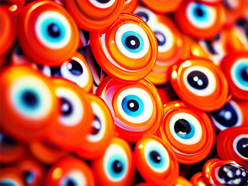 Collection Of Orange Evil Eye Charms
