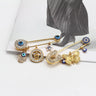 Elegant Gold-Toned Turkish Evil Eye Brooch with Tassel Detail – Timeless Charm for Women & Girls