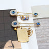 Elegant Gold-Toned Turkish Evil Eye Brooch with Tassel Detail – Timeless Charm for Women & Girls