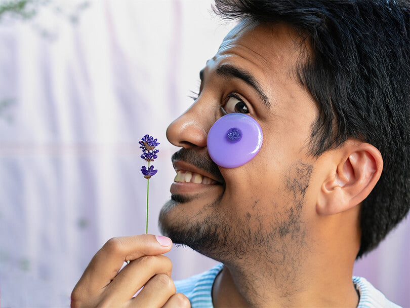 Person Expressing Joy With Lavender Evil Eye Item
