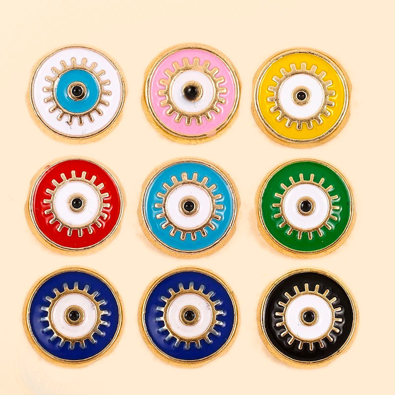 Assorted round evil eye charm bead designs arranged in a grid
