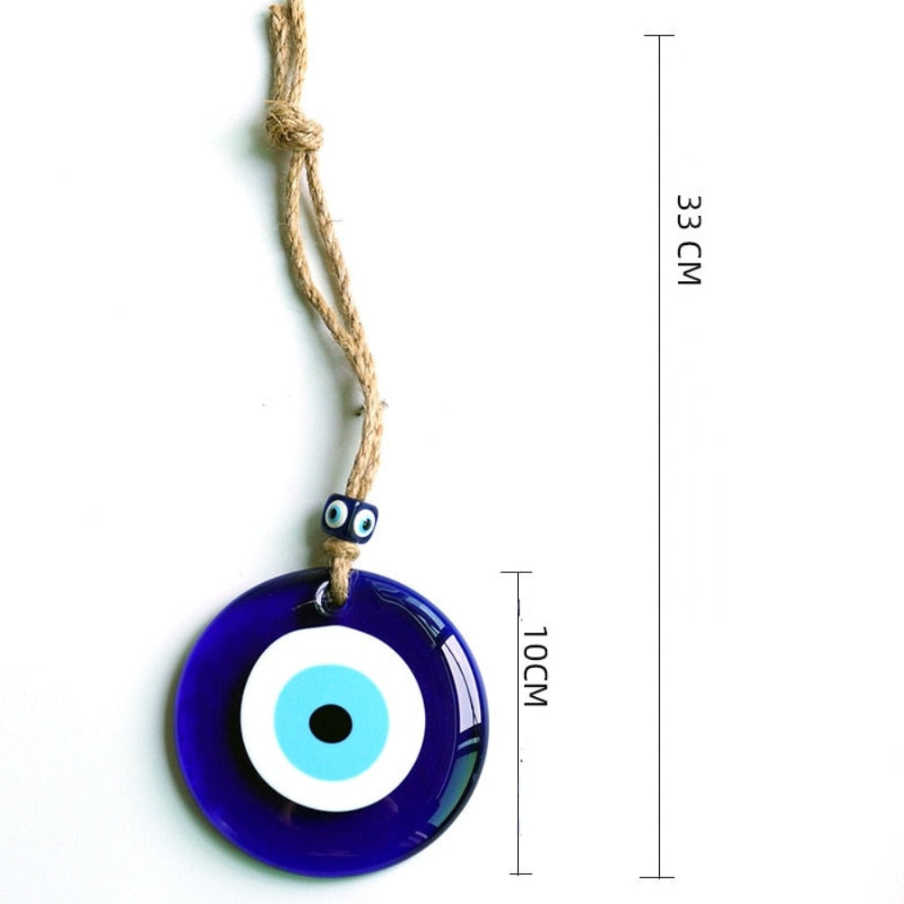 Glass pendant with evil eye design