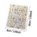 10 by 8 centimeter sheet of blue and gold-tone evil eye nail stickers