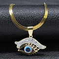 Curved Brow necklace in gold tone with a sweeping clear-accented brow above an open eye design and blue center