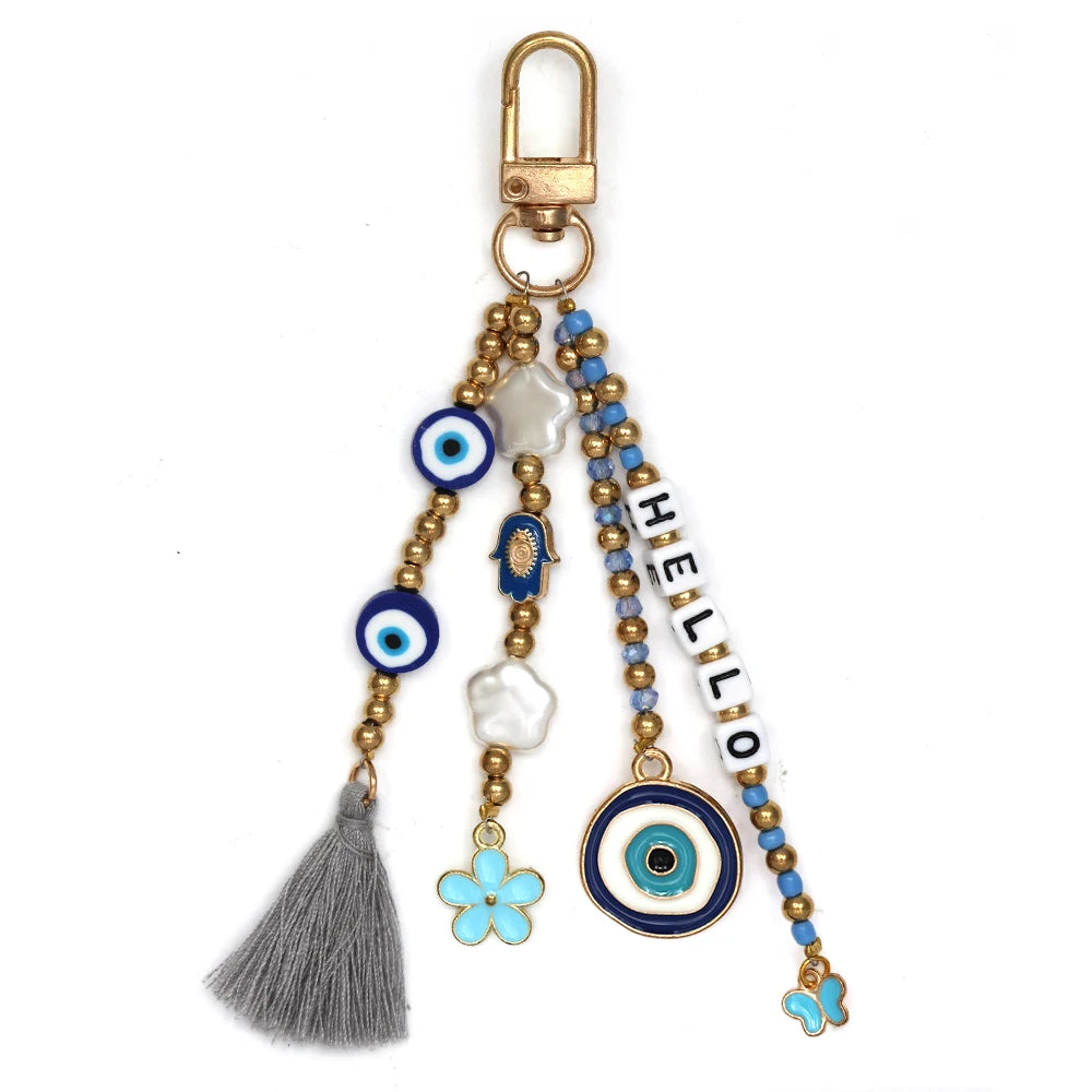 Ward Off Negativity with this Turkish Evil Eye Heart Pendant Tassel Keychain for Good Luck