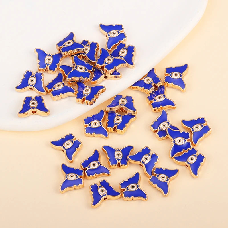 Blue butterfly-shaped evil eye charm beads