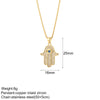 Gold + Hamsa