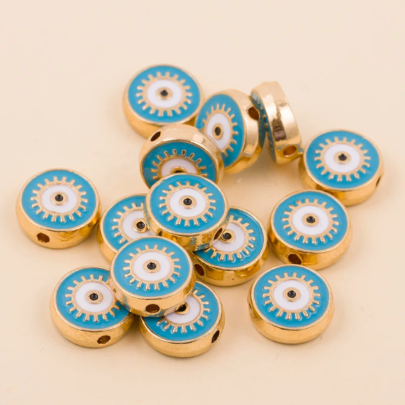 Turquoise round evil eye charm beads with gold-tone edges