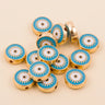 Turquoise round evil eye charm beads with gold-tone edges