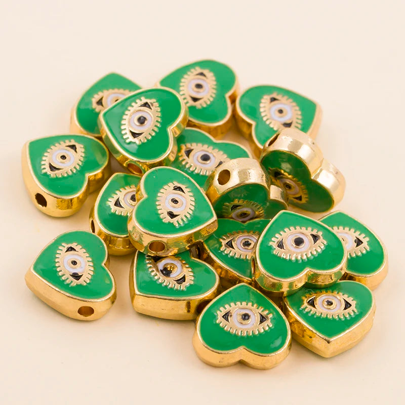 Green heart-shaped evil eye charm beads
