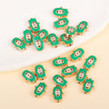 Green Hamsa-shaped evil eye charm beads