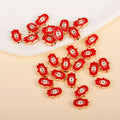 Red Hamsa-shaped evil eye charm beads