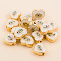 White teardrop-shaped evil eye charm beads