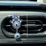 Silver tone Hamsa clip with a vertical annotation reading 6.2 cm / 2.44 in and a horizontal annotation reading 3.6 cm / 1.42 in.