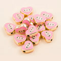 Pink teardrop-shaped evil eye charm beads