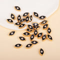 Black marquise-shaped evil eye charm beads