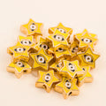 Yellow star-shaped evil eye charm beads