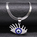 Lash Eye necklace in silver tone with long upper lashes, clear accents and a blue ring around the eye center