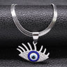 Lash Eye necklace in silver tone with long upper lashes, clear accents and a blue ring around the eye center