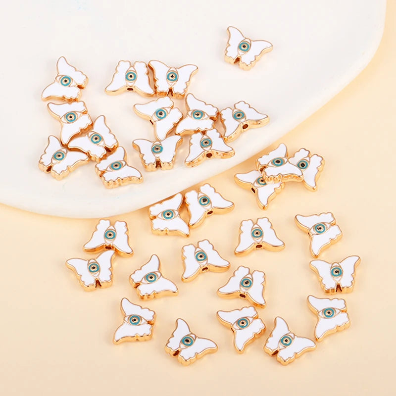 White butterfly-shaped evil eye charm beads