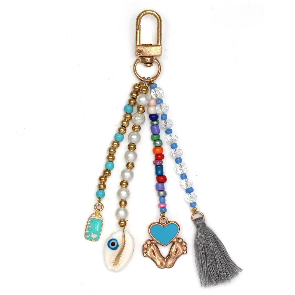 Ward Off Negativity with this Turkish Evil Eye Heart Pendant Tassel Keychain for Good Luck