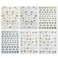Six sheets of decorative hamsa hand decals arranged in a 2x3 grid. The sheets feature various designs including blue and white evil eye patterns, gold suns and moons, and multicolored hamsa hands on a white background.