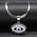 Sunburst Eye necklace in silver tone with pointed upper rays, lower triangular details and a blue and white center