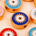 Close-up of multicolored round evil eye charm bead designs