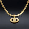 Back of the Open Eye pendant in gold tone, showing its plain reverse and eye-shaped openings beneath the flat chain