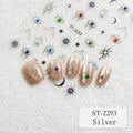 Five false nails displayed on a textured white background, decorated with silver glitter and small colorful evil eye and star motifs. Matching nail designs are also shown on a sheet above, with the text 'ST-2293 Silver' in the bottom right corner.