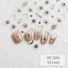 Five false nails displayed on a textured white background, decorated with silver glitter and small colorful evil eye and star motifs. Matching nail designs are also shown on a sheet above, with the text 'ST-2293 Silver' in the bottom right corner.
