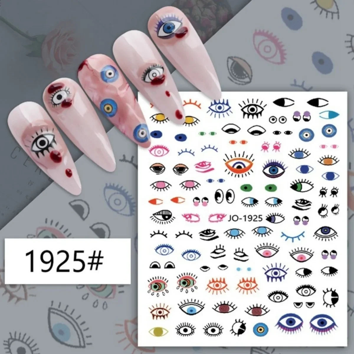 Multicolored illustrated eye nail stickers displayed on pink manicure samples
