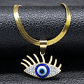 Lash Eye necklace in gold tone with long upper lashes, clear accents and a blue ring around the eye center