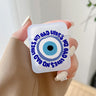 Handheld frosted earphone case with a large blue circular eye surrounded by repeating NO BAD VIBES lettering.