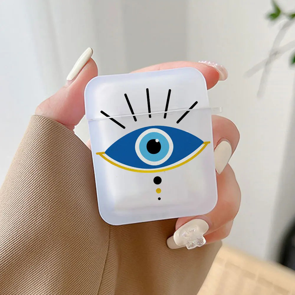 Handheld frosted earphone case with a large blue eye, black rays and a yellow arc beneath the eye.