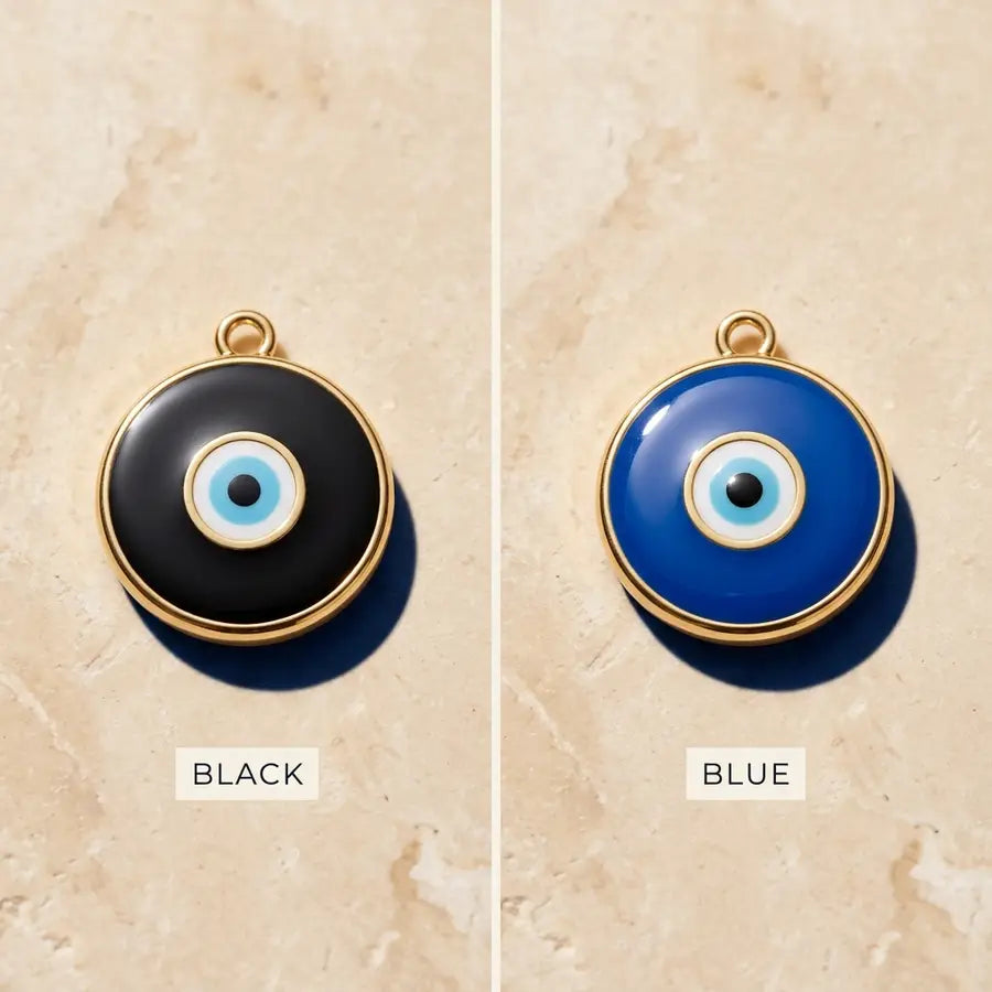 Black and blue evil eye charms shown at equal size with matching gold rims and a clean vertical divider.