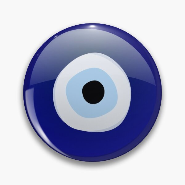 Round deep blue button pin with white and pale blue eye rings surrounding a black center.