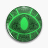 Green round button pin with a large bright green eye over a layered pattern of smaller eyes.