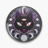 Round dark button pin with a three-eyed black cat, purple illustrated crystals, stars and moon phases.