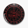 Black round button pin with red line art of a triangular eye character wearing a top hat, surrounded by symbols.