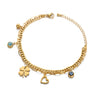Gold tone double-chain bracelet with clover, open heart and blue eye charms on a white background.