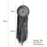 Round black floral dream catcher with measurement guides beside the circular frame and long fringe, plus printed size and weight labels.